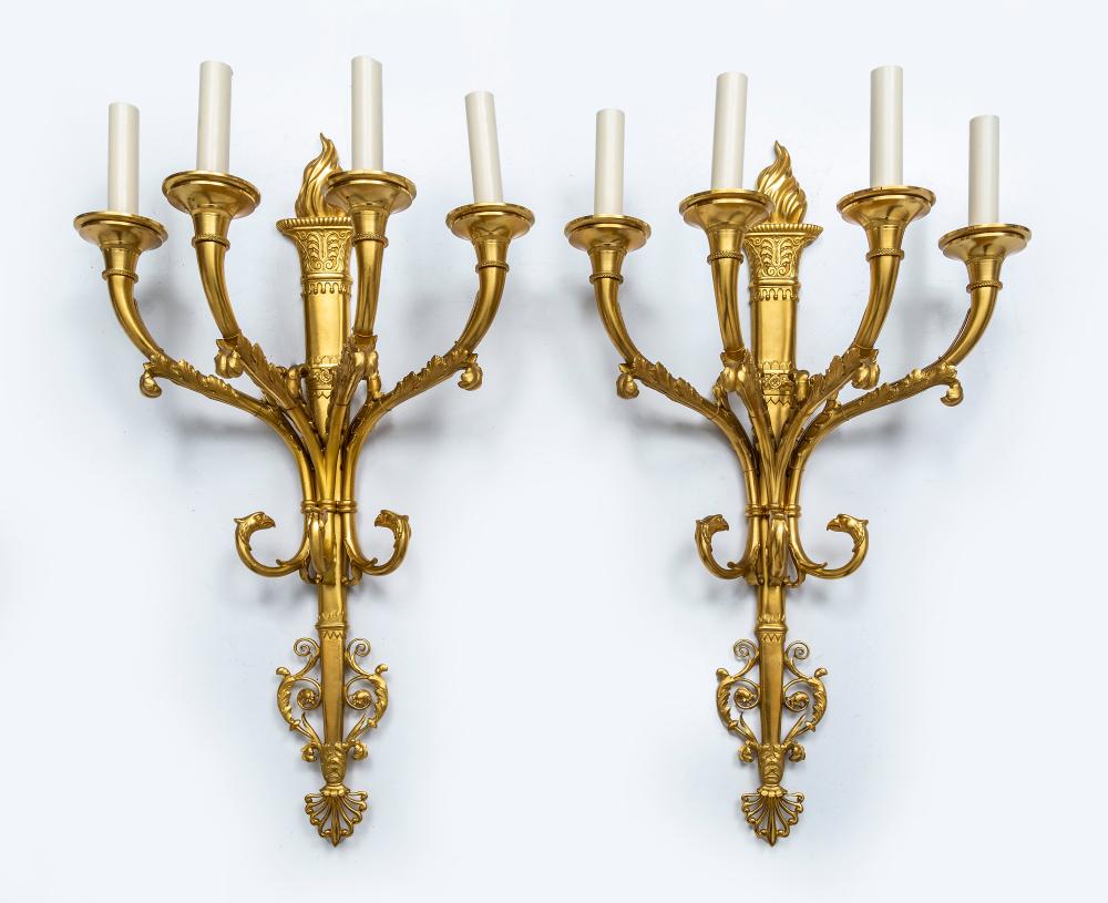 A pair of impressive heavy gauge four branch gilt bronze torchere wall sconces, French 19th Century