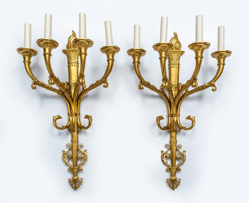 A pair of impressive heavy gauge four branch gilt bronze torchere wall sconces, French 19th Century