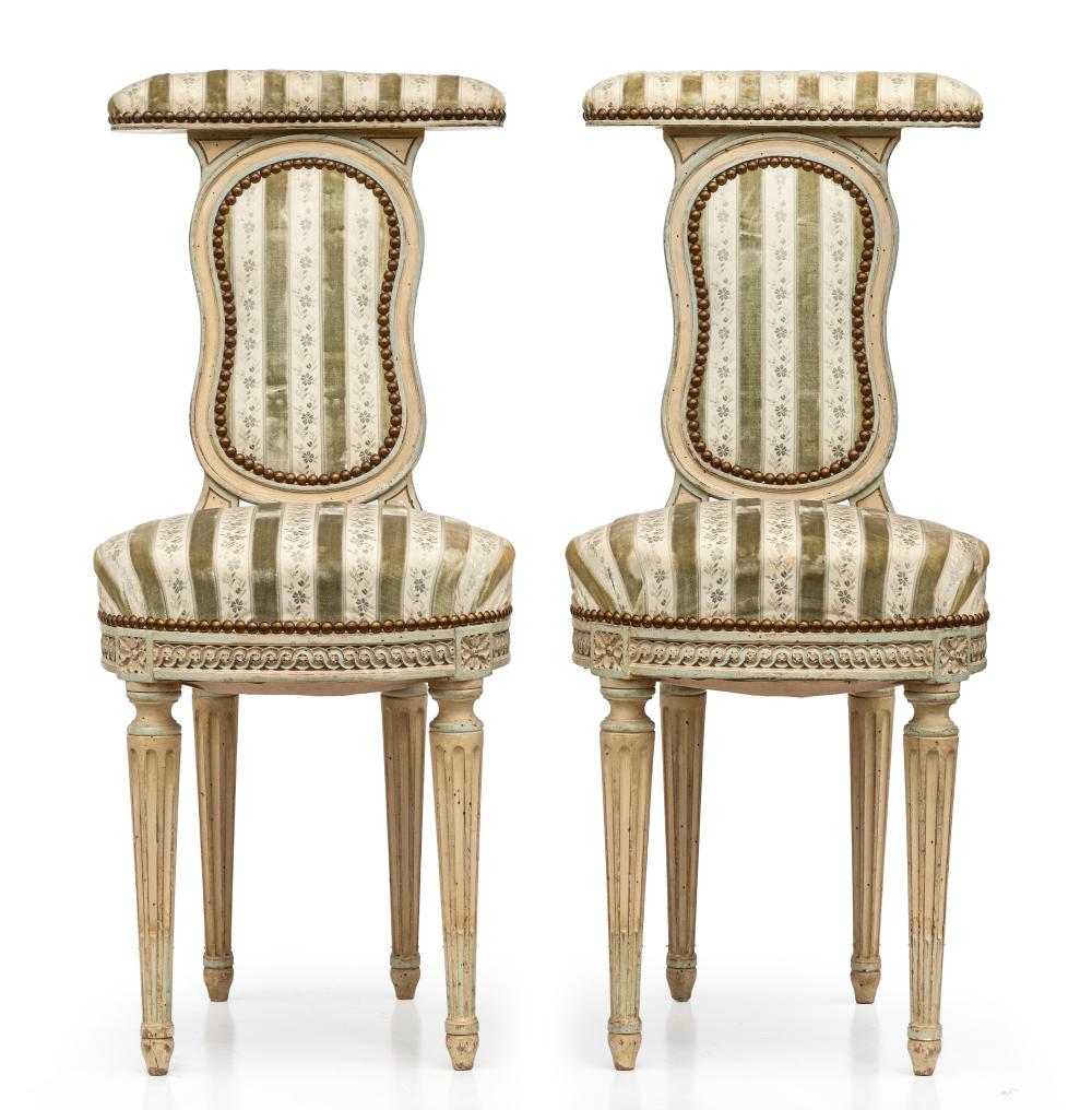 A pair of cream-painted and floral striped velvet upholstered boudoir chairs French 19th Century