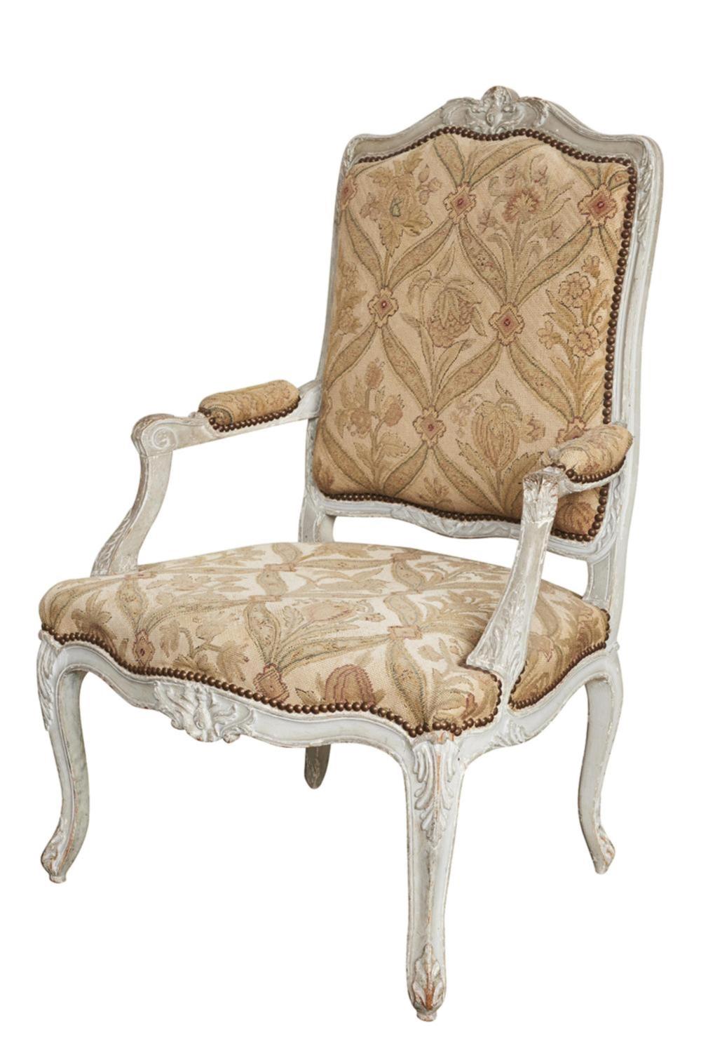A pale grey painted fauteuil with original floral needlework upholstery French Circa 1900