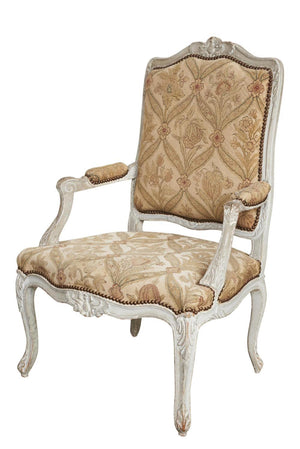 A pale grey painted fauteuil with original floral needlework upholstery French Circa 1900