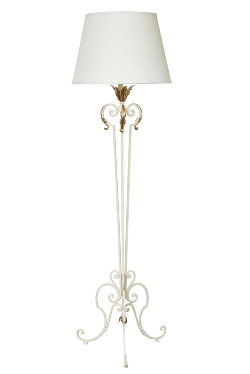 SOLD A stylish white painted metal floor lamp with gilt leaf decoration French Circa 1940 with ivory shade