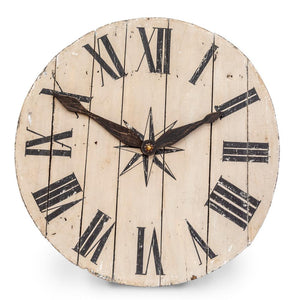 A large and decorative rustic French painted timber wall clock