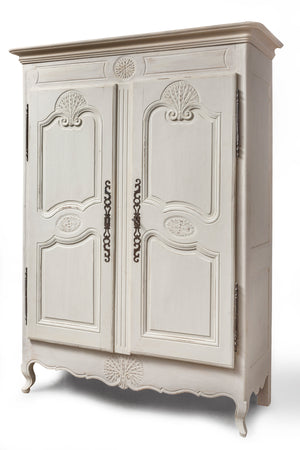 SOLD A powder white painted Armoire, carved with wheat details, French 19th Century