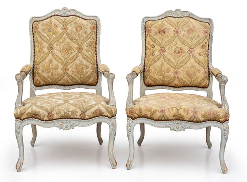 A pair of pale grey painted Louis XV style armchairs, French 19th Century