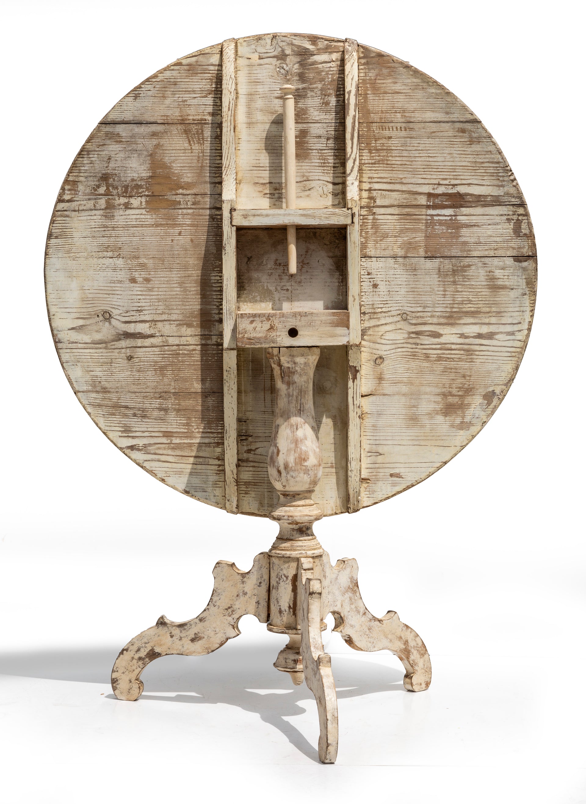 SOLD A rustic decoratively painted white timber circular tilt-top table, Swedish 19th Century