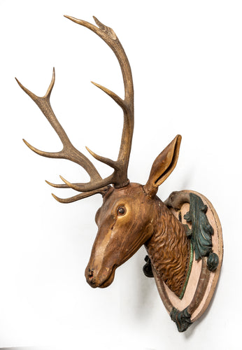 A wonderful painted and carved timber wall mounting stags head, French 19th Century