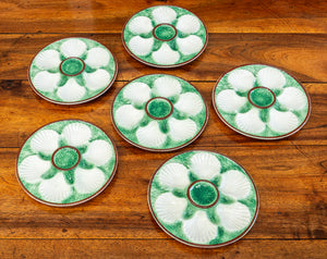 SOLD A set of six green, white and chocolate majolica scallop plates, French Circa 1900