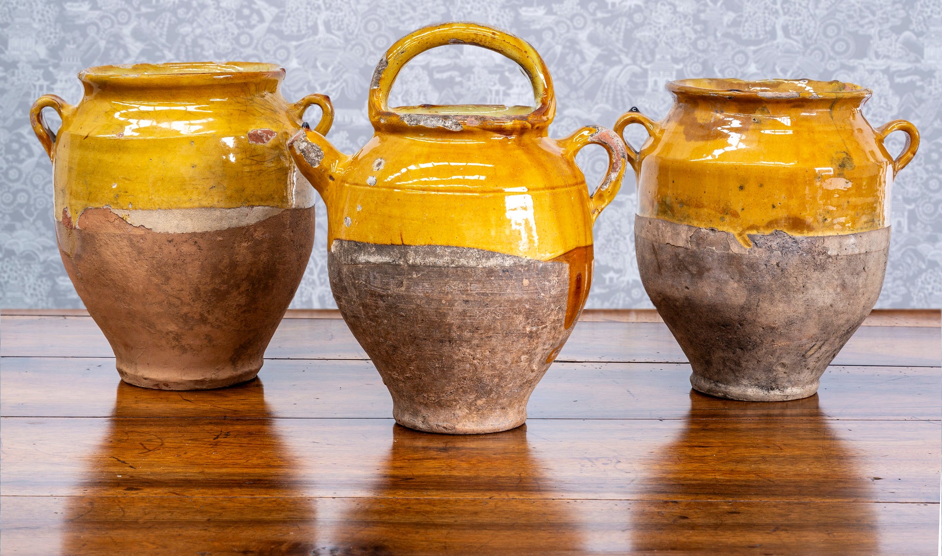 SOLD A selection of terracotta mustard glazed confit jars, French 19th Century