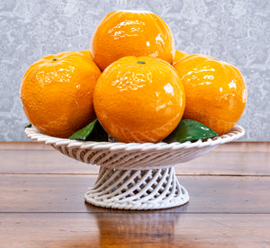 SOLD A vintage Spanish ceramic basket of oranges table centrepiece