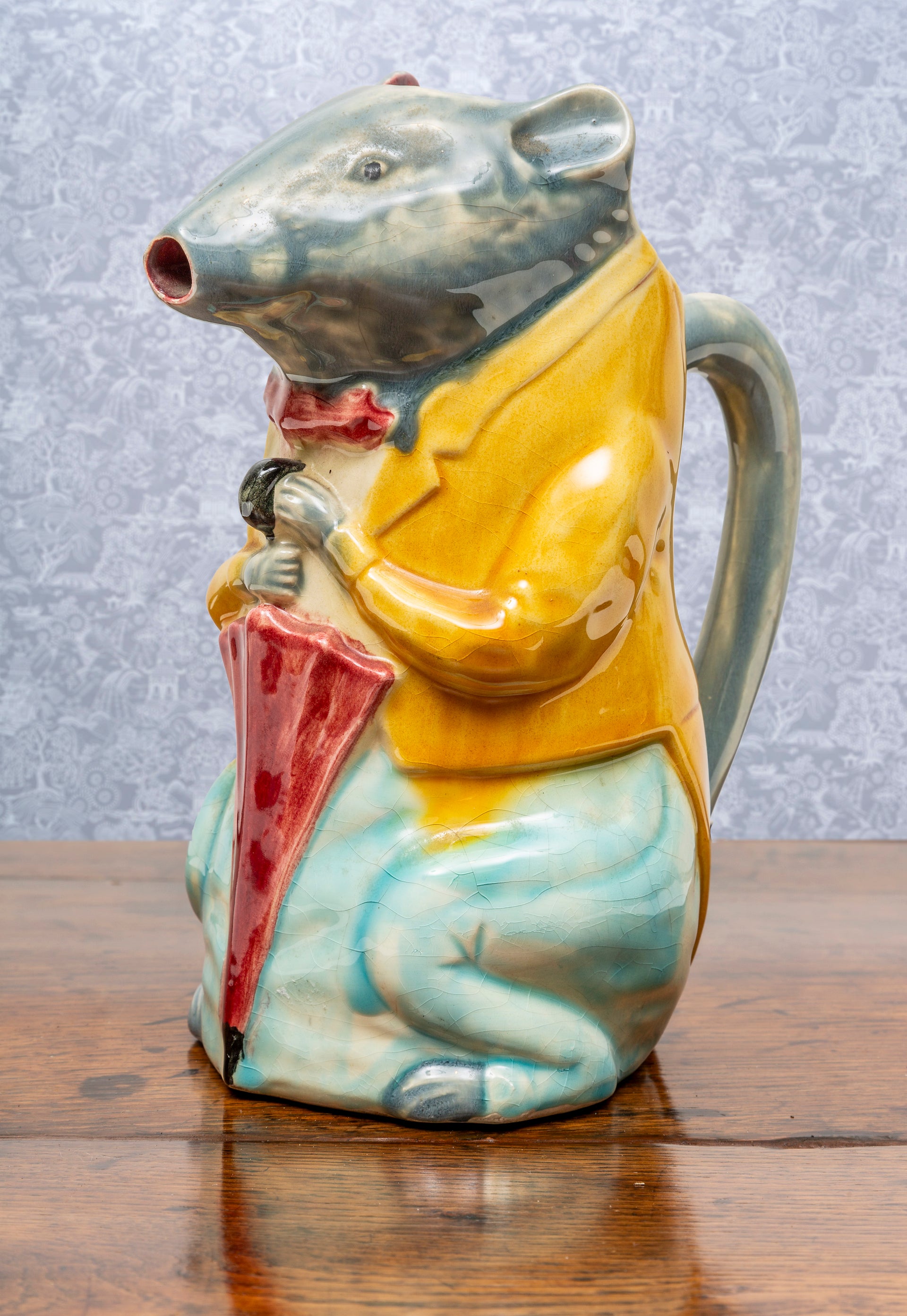 SOLD A charming ceramic mouse holding an umbrella pitcher, French Circa 1950