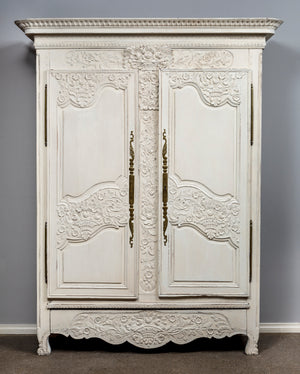 SOLD A beautifully carved white painted oak armoire of attractive proportions, French early 19th Century