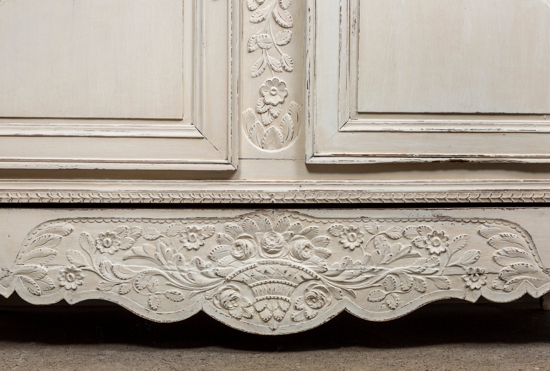 SOLD A beautifully carved white painted oak armoire of attractive proportions, French early 19th Century