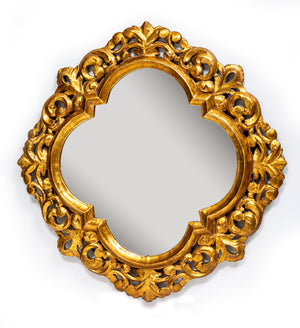 SOLD A finely carved giltwood quatrefoil and foliate design wall mirror, French 19th Century