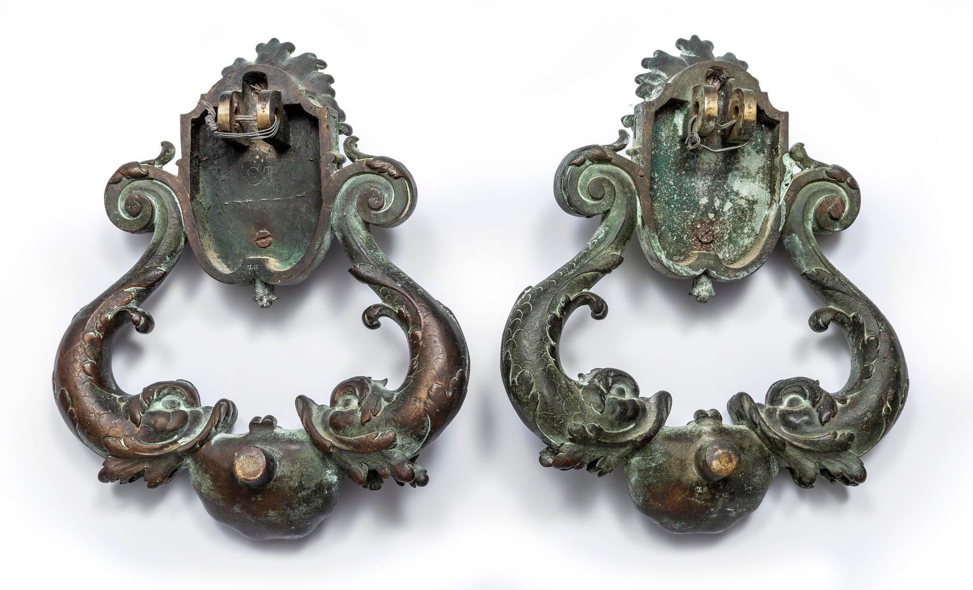 SOLD An exceptional pair of bronze door knockers, cast with the head of Neptune and twin dolphins French 19th Century