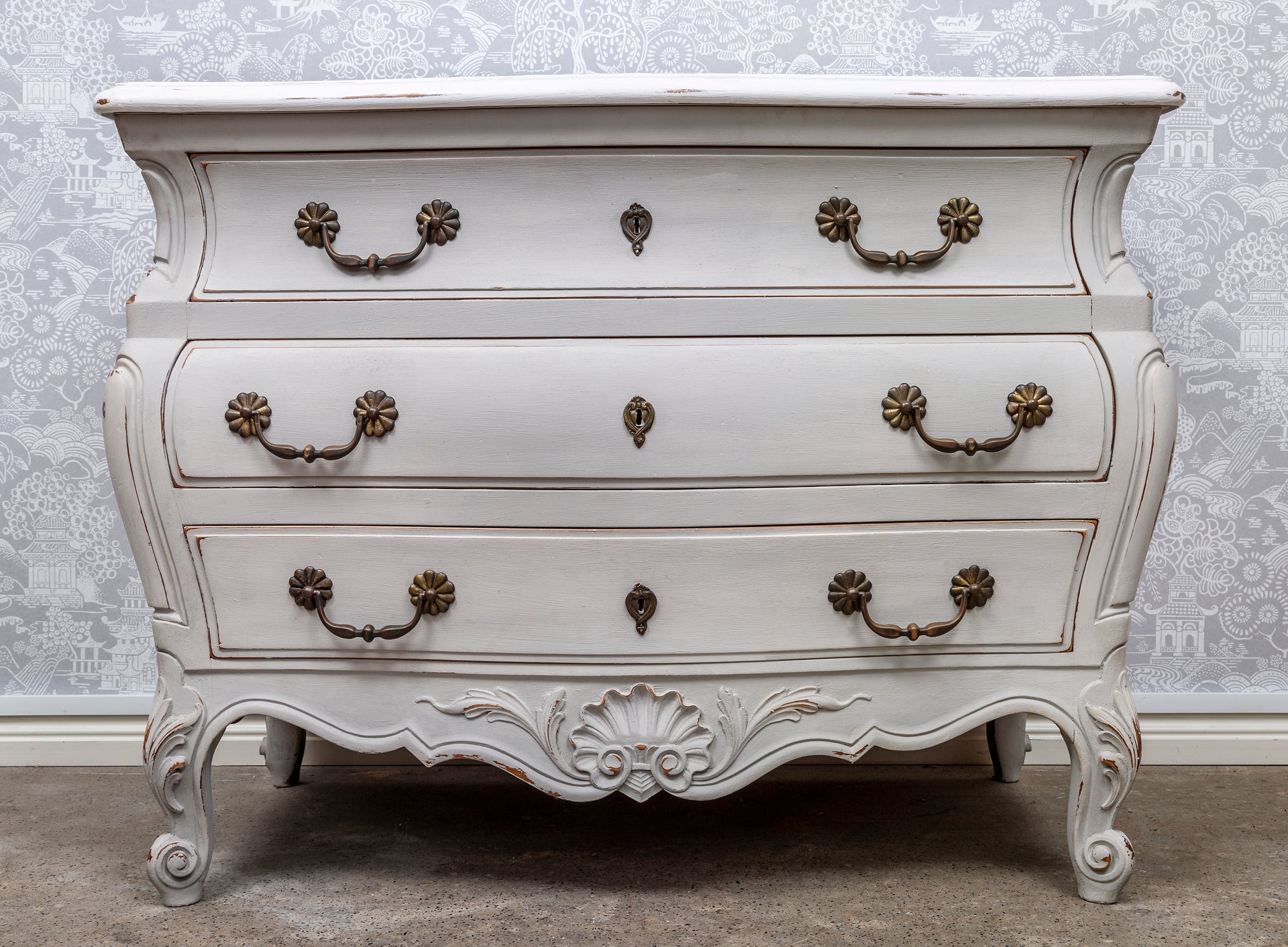 SOLD A stylish serpentine fronted Paris-grey painted commode, French Circa 1950