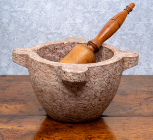 SOLD A soft pink marble mortar and fruitwood pestle, French 19th Century