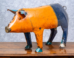 SOLD A contemporary French industrial orange painted metal pig sculpture