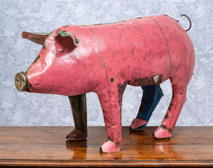 SOLD A contemporary French industrial pink painted metal pig sculpture