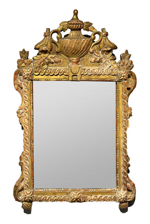 SOLD A beautifully carved giltwood wall mirror, French 18th Century
