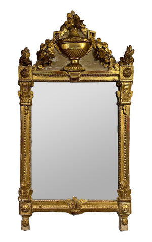 SOLD A beautifully carved giltwood wall mirror, French 18th Century