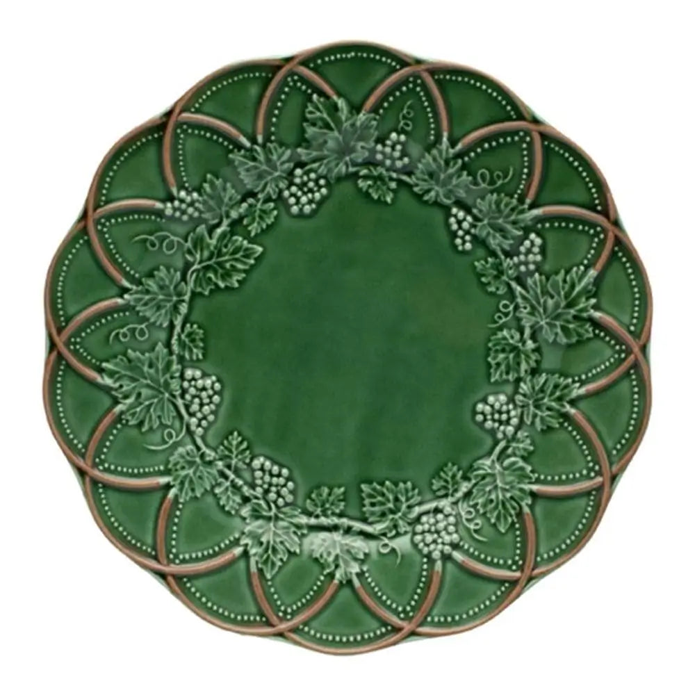 A set of four Woods dinner plates by Bordallo Pinheiro, Portugal