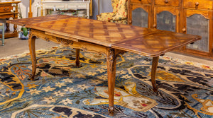 SOLD A stylish Versailles parquetry oak extension dining table, French Circa 1940