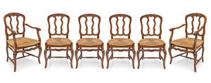 SOLD A lovely set of six carved fruitwood chairs with rush seats, French 19th Century