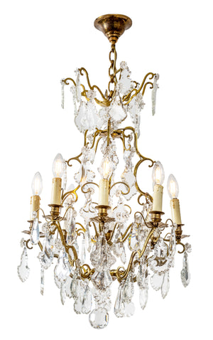 SOLD A very decorative and good quality gilt metal and crystal eight branch chandelier, French Circa 1940