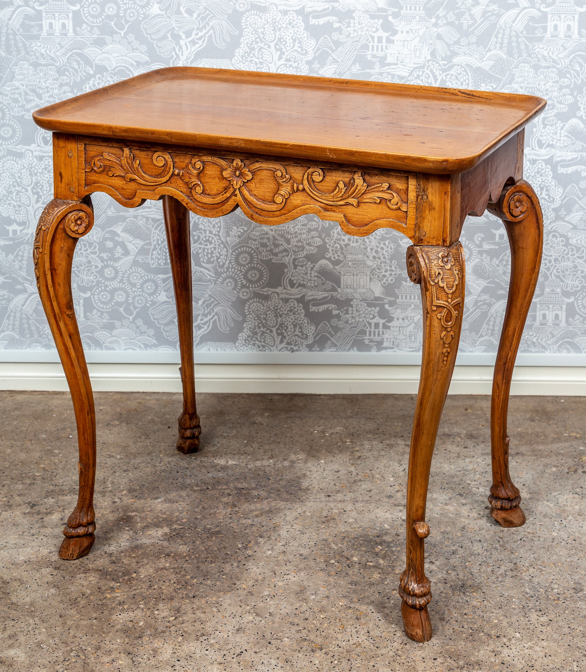 SOLD A very delicately carved walnut Louis XV style side-table, French late 18th century