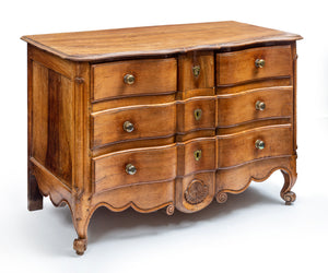 SOLD A lovely Provincial fruitwood serpentine four-drawer commode, French 18th Century