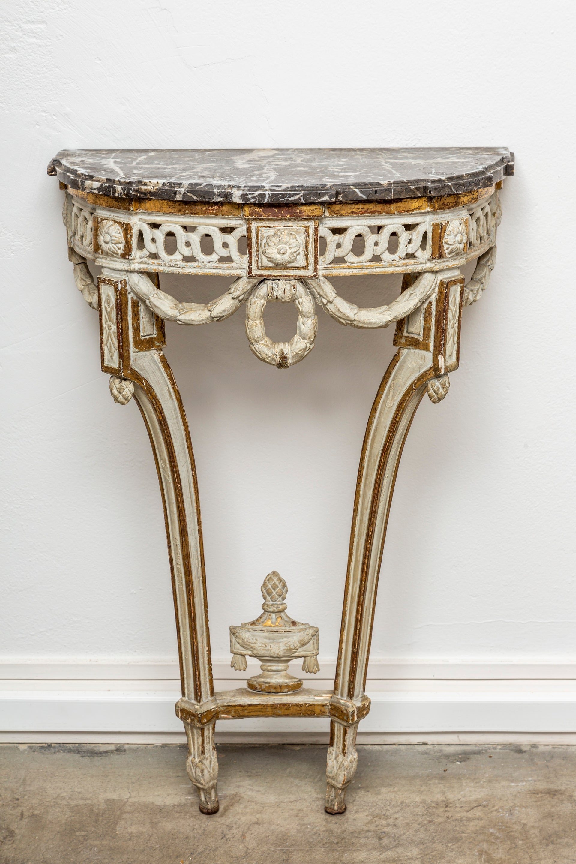 A beautiful giltwood and cream painted Louis XVI console table, French late 18th Century