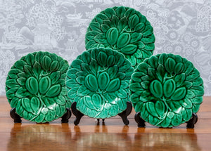 SOLD A set of four plum design green faience fruit plates, French Circa 1900 by Sarreguemines