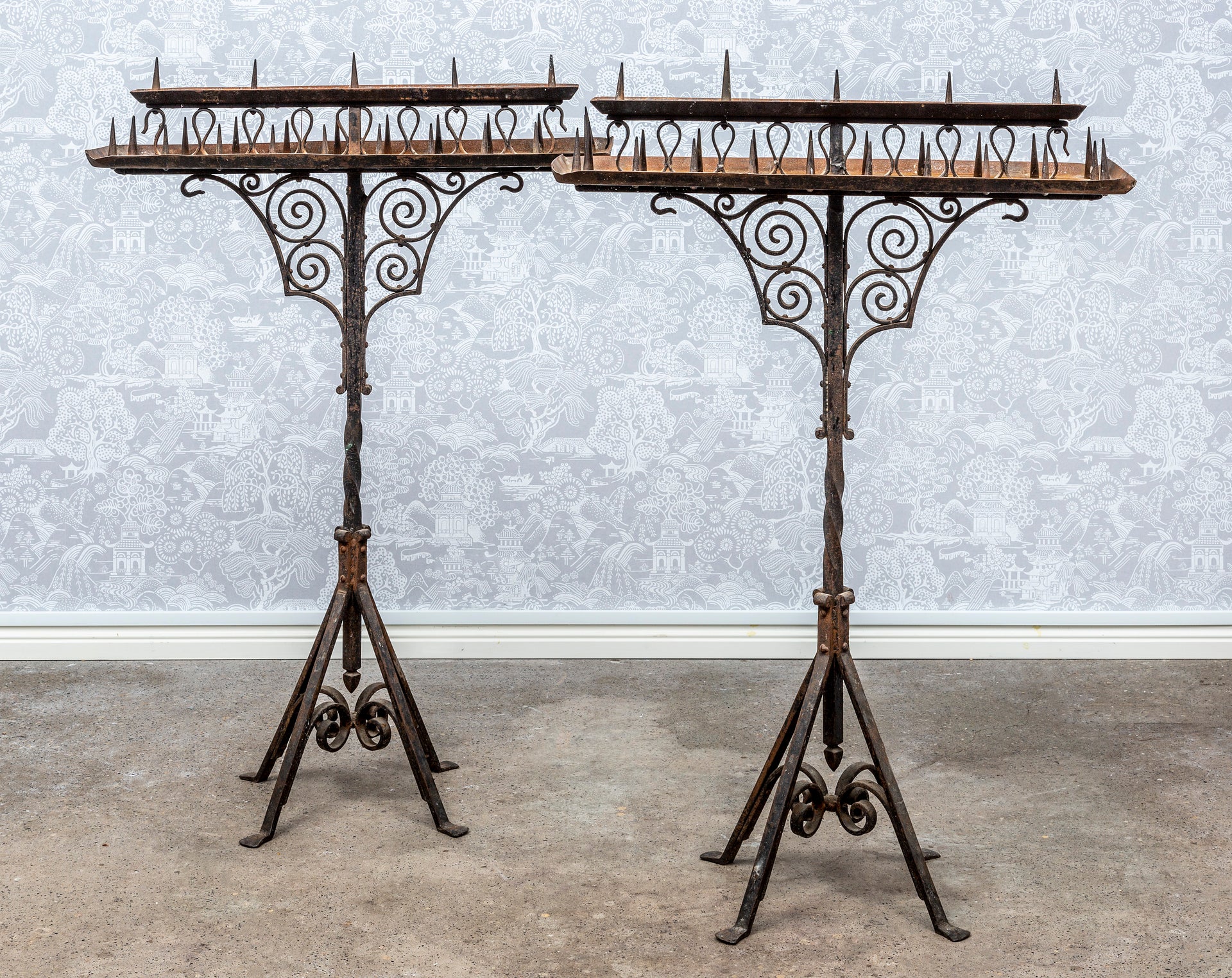 SOLD A pair of impressive and very decorative black painted wrought iron floor candle-stands, French 19th century