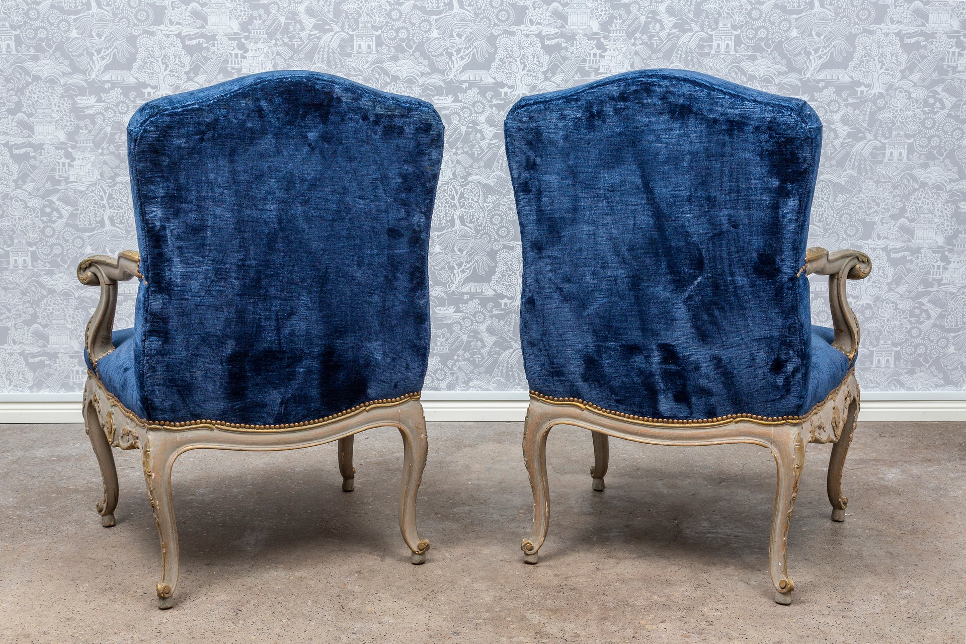 SOLD A pair of handsome carved and giltwood painted armchairs in the Louis XV manner, French circa 1920