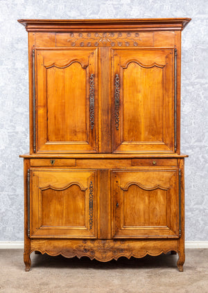 SOLD A finely carved cherrywood buffet a deux- corps, French circa 1800