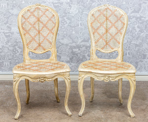 A pretty pair of white painted caned back Louis XV period salon chairs, French 19th century