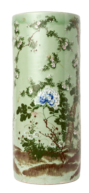 SOLD A pale green ground porcelain umbrella stand decorated with blossoms, Japanese Circa 1920