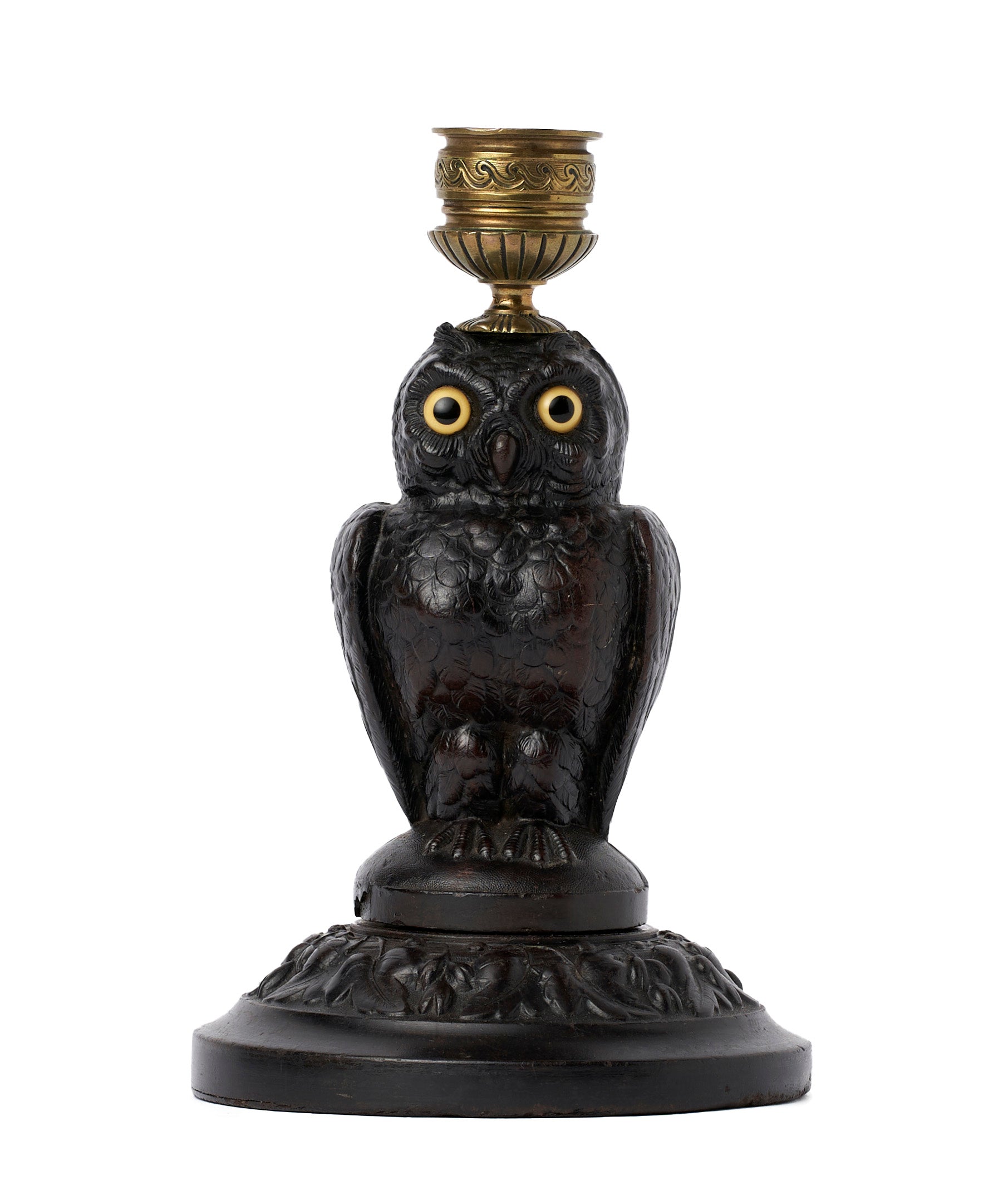 SOLD A very appealing pressed resin and brass owl-form candlestick, Black Forest Region circa 1880