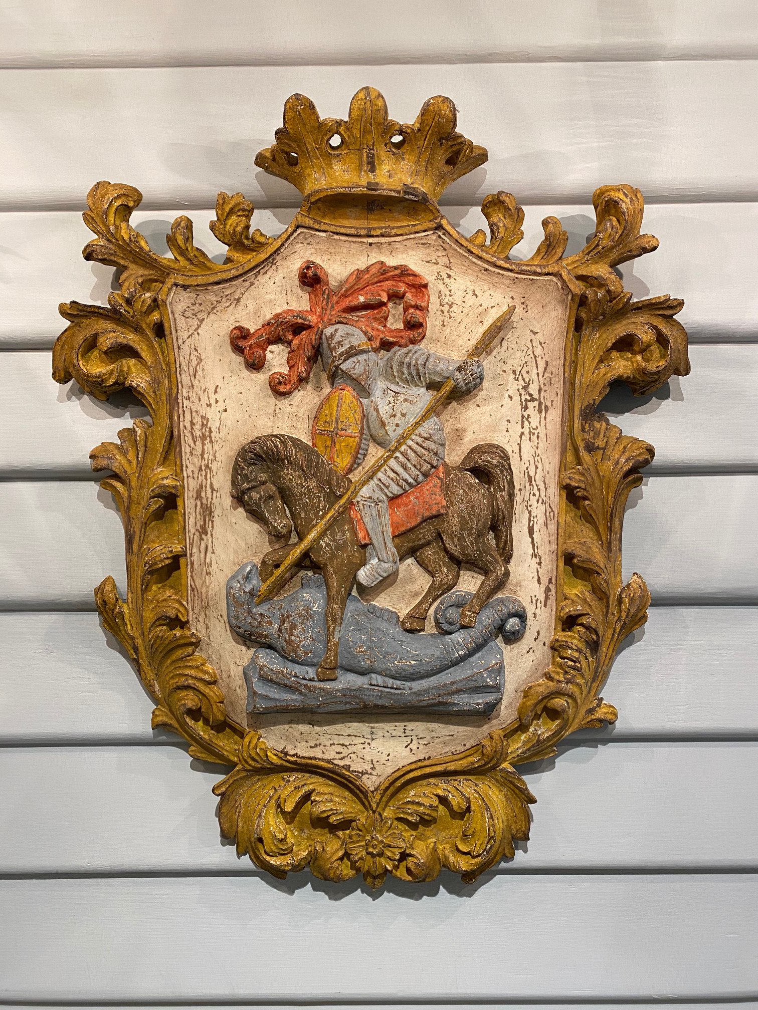 SOLD A highly decorative Italian carved polychrome Coat of Arms