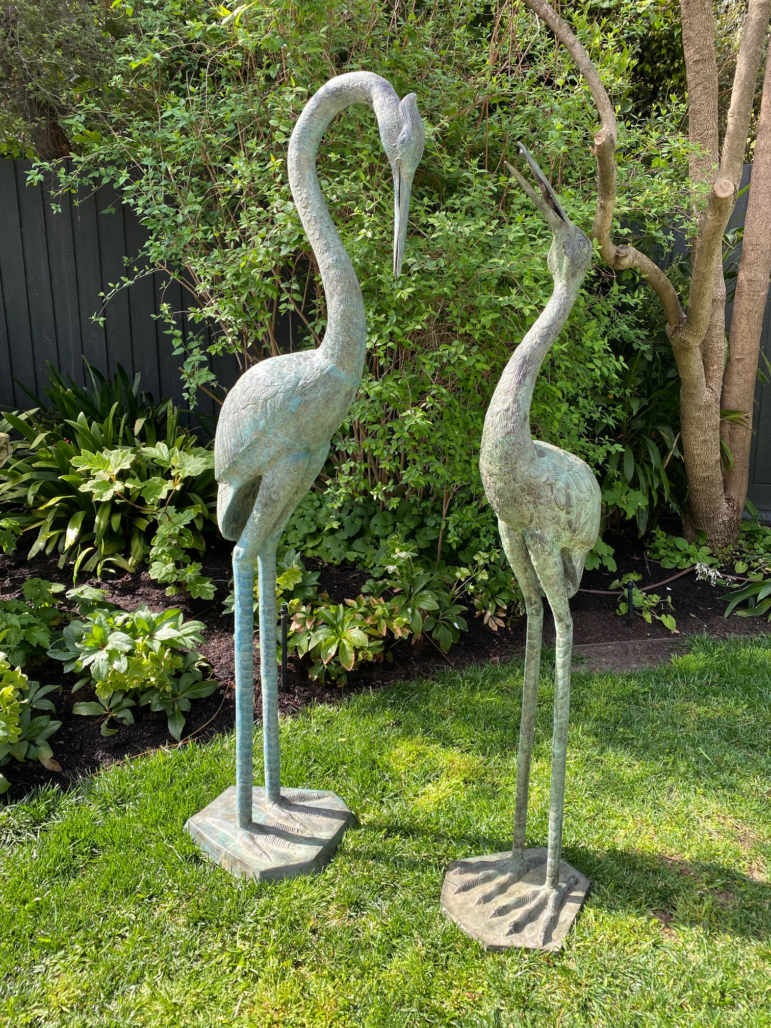SOLD A beautiful pair of large bronze water birds with verdigris finish, in the Japanese style