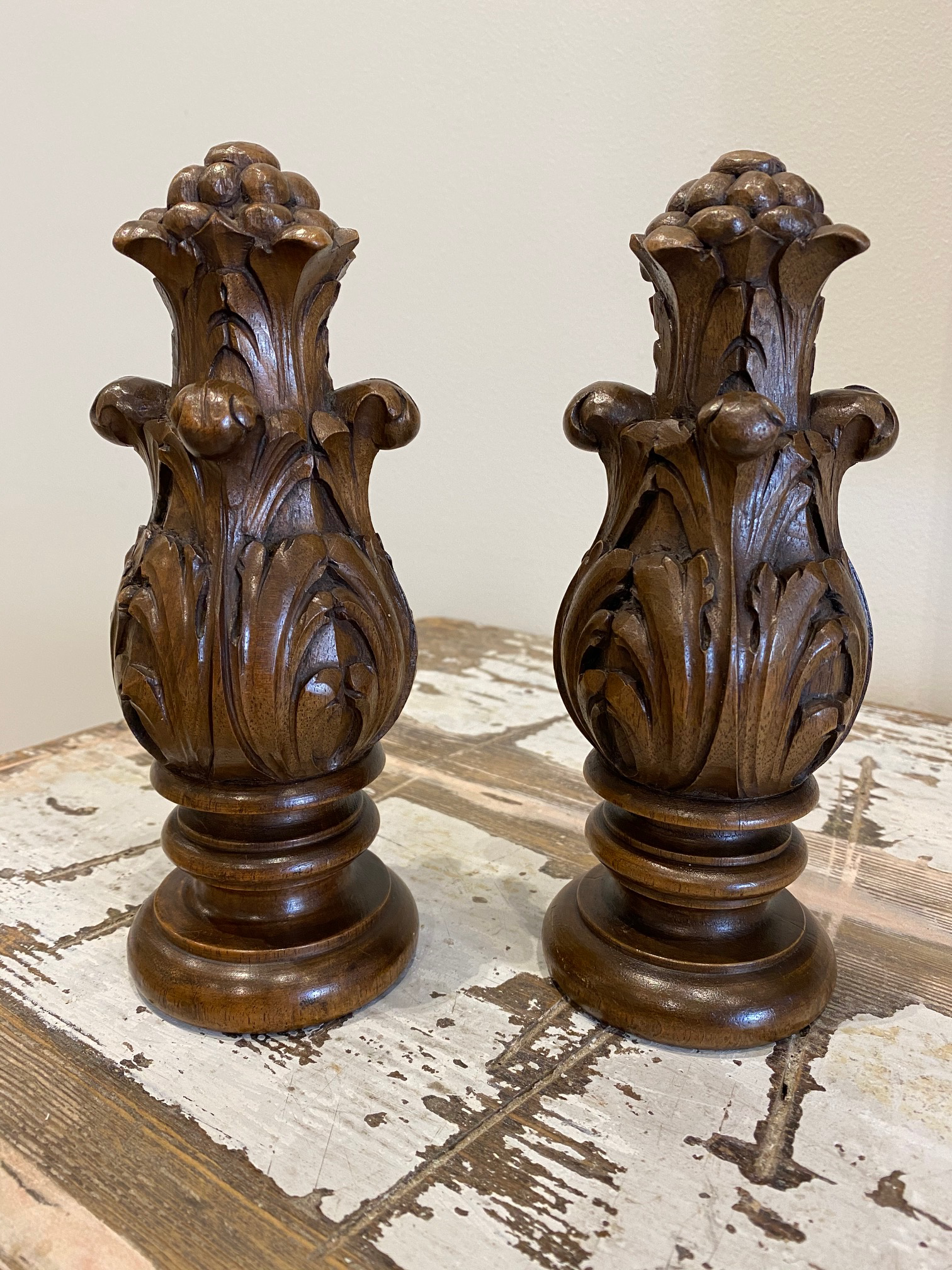 SOLD A pair of beautifully carved curtain-rod finials, French 19th Century