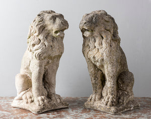 SOLD A pair of French vintage composite stone seated lions