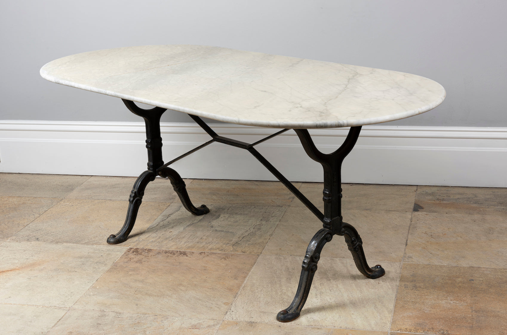 SOLD An impressive black painted cast iron table with large Carrara marble oval top, French 19th Century