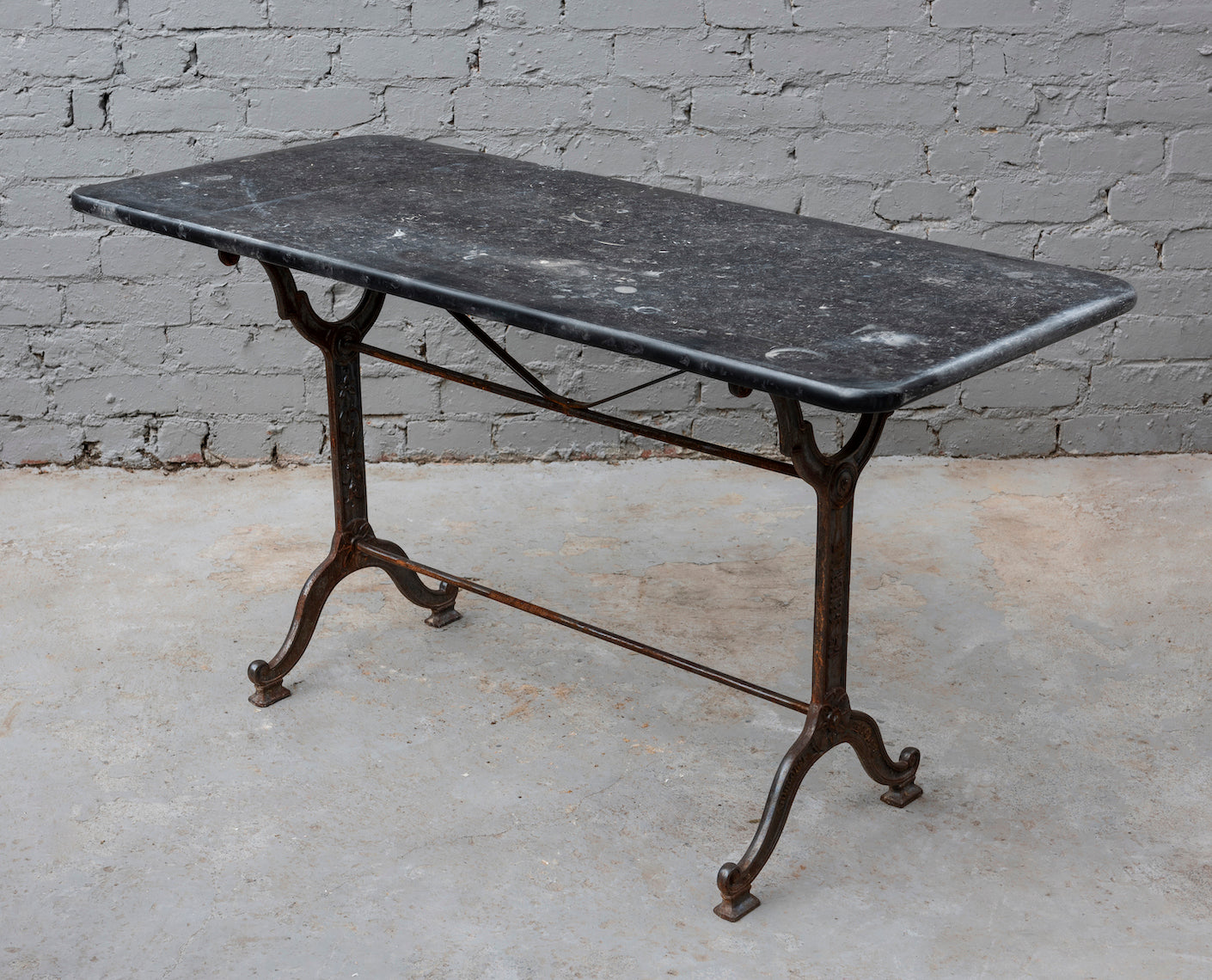 SOLD A black fossil marble topped cast-iron garden table, French 19th Century