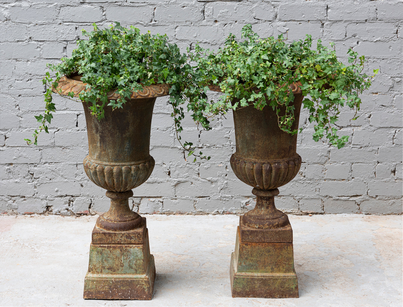 SOLD A pair of large cast-iron Classical urns on stands, French 19th Century