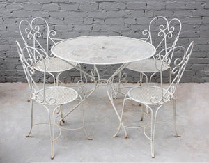 SOLD A white painted metal five piece garden setting, French Circa 1950