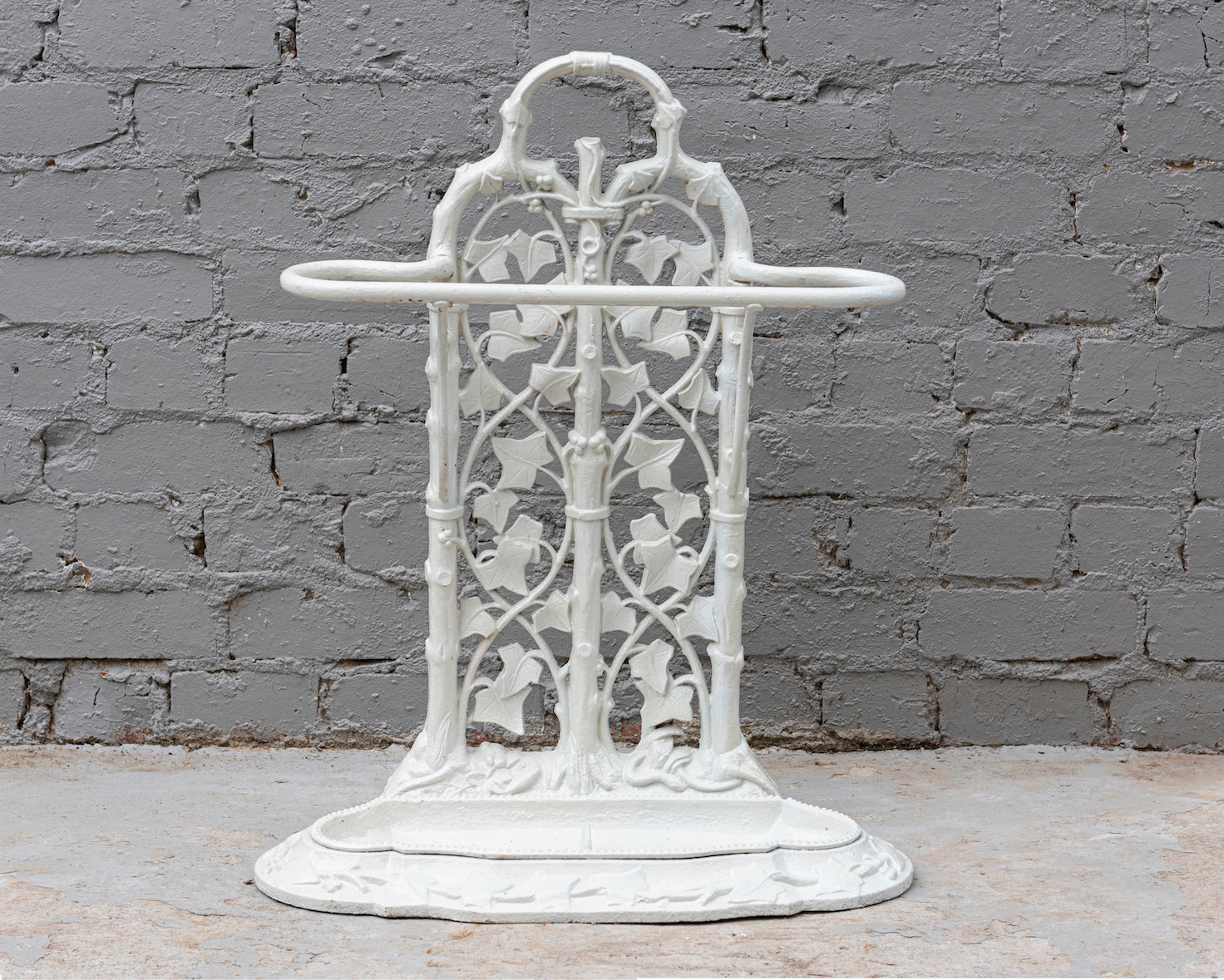 SOLD A white painted cast iron ivy pattern umbrella stand, French 19th Century