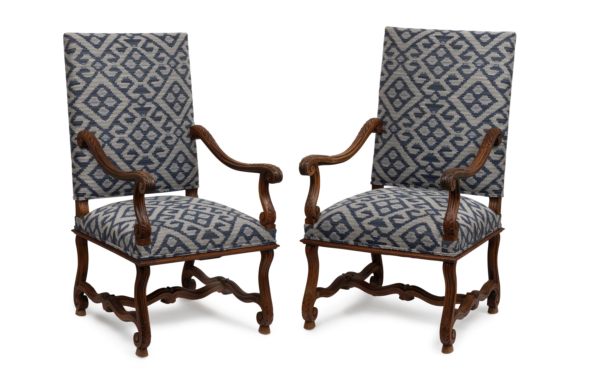 SOLD A pair of acanthus design carved walnut armchairs, French 19th Century
