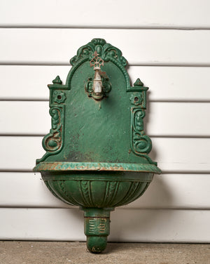 SOLD A vintage French dark green painted cast iron shell design wall font